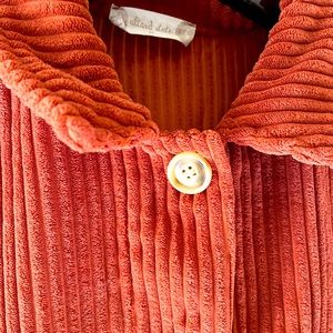 Alter’d State Corduroy Jacket in burnt orange with front pockets and long sleeve